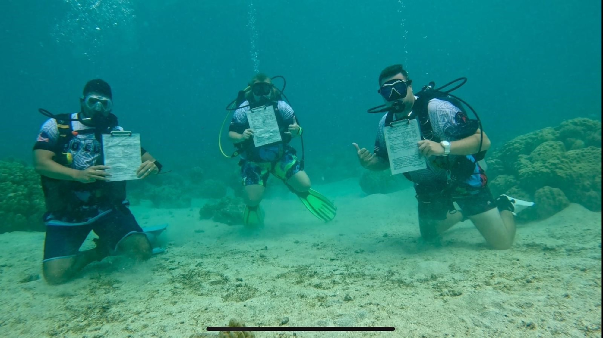 Image of individuals underwater performing air force operations.