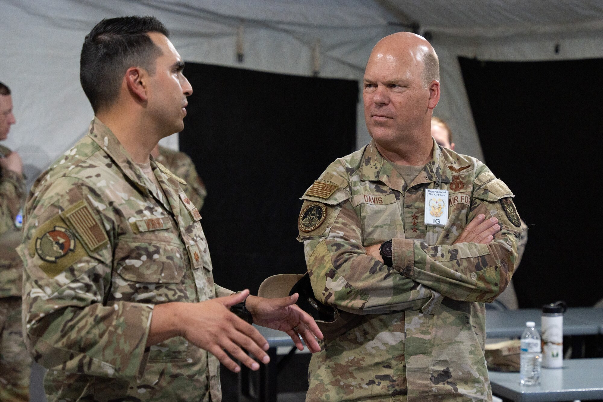 U.S. Air Force Maj. Aaron Moreno, 27th Special Operations Wing evaluator pilot, speaks to U.S. Air Force Lt. Gen. Stephen Davis, Department of the Air Force Inspector General, about the capabilities of the 27th SOW’s Mission Sustainment Team, Cannon Air Force Base, New Mexico, July 30, 2024. Davis’ visit focused on combat readiness and accurately assessing the readiness required to succeed against peer or near-peer adversaries across the spectrum of competition, including conflict. (U.S. Air Force photo by Airman 1st Class Tori Shearn)