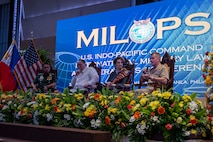 From right to left, Adm. Samuel J. Paparo, commander of U.S. Indo-Pacific Command, Ambassador Marykay Carlson, U.S. ambassador to the Philippines, Gilberto C. Teodoro Jr., Secretary of National Defense of Philippines, and Gen. Romeo S. Brawner Jr., Chief of Staff of the Armed Forces of the Philippines, participate in a panel discussion during the 35th annual International Military Law and Operations Conference in the Philippines, Aug. 27.