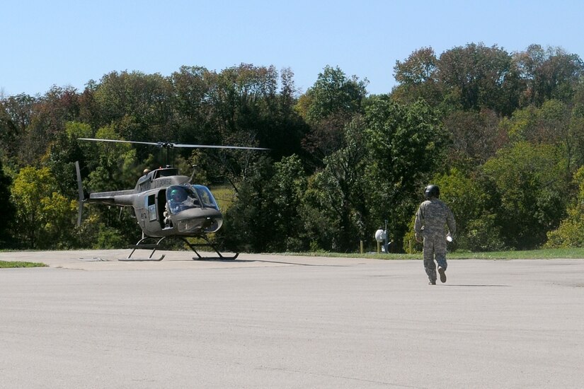 Soldiers at the Army Aviation Support Facility prepare for a test flight in a OH-58 helicopter in Frankfort, Ky., Sept. 24, 2012. The Kentucky Guard provides maintenance support to all OH-58s in the National Guard.