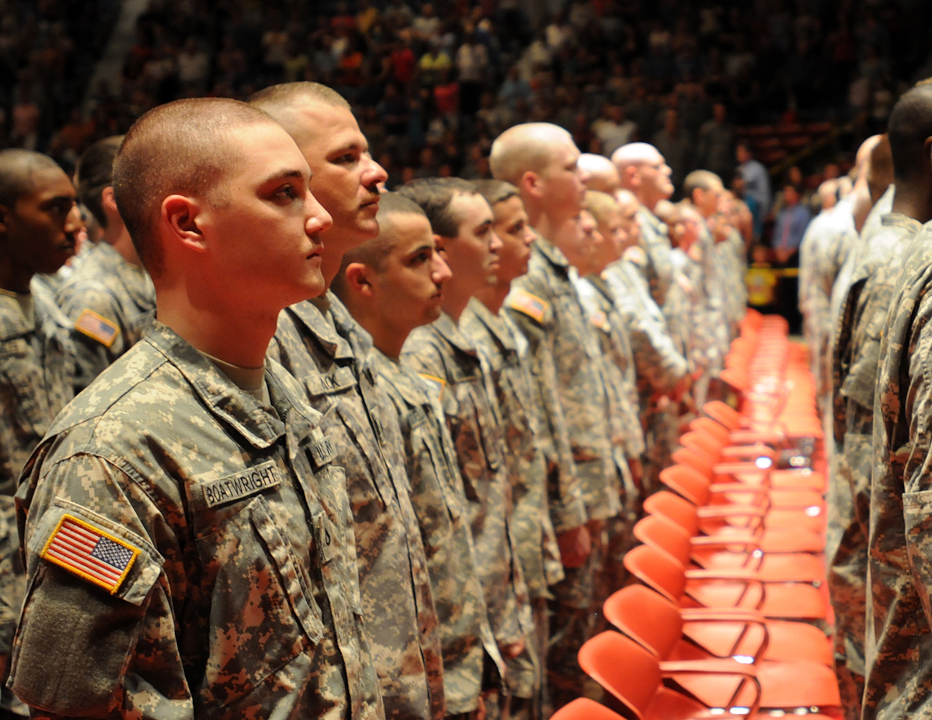 Soldiers of the 2nd Battalion, 138th Field Artillery stand at attention during the singing of the National Anthem at the unit's farewell ceremony in Frankfort, Ky., Aug. 31, 2012. The unit deployed to the Horn of Africa to protect U.S. and Coalition interests in East Africa.