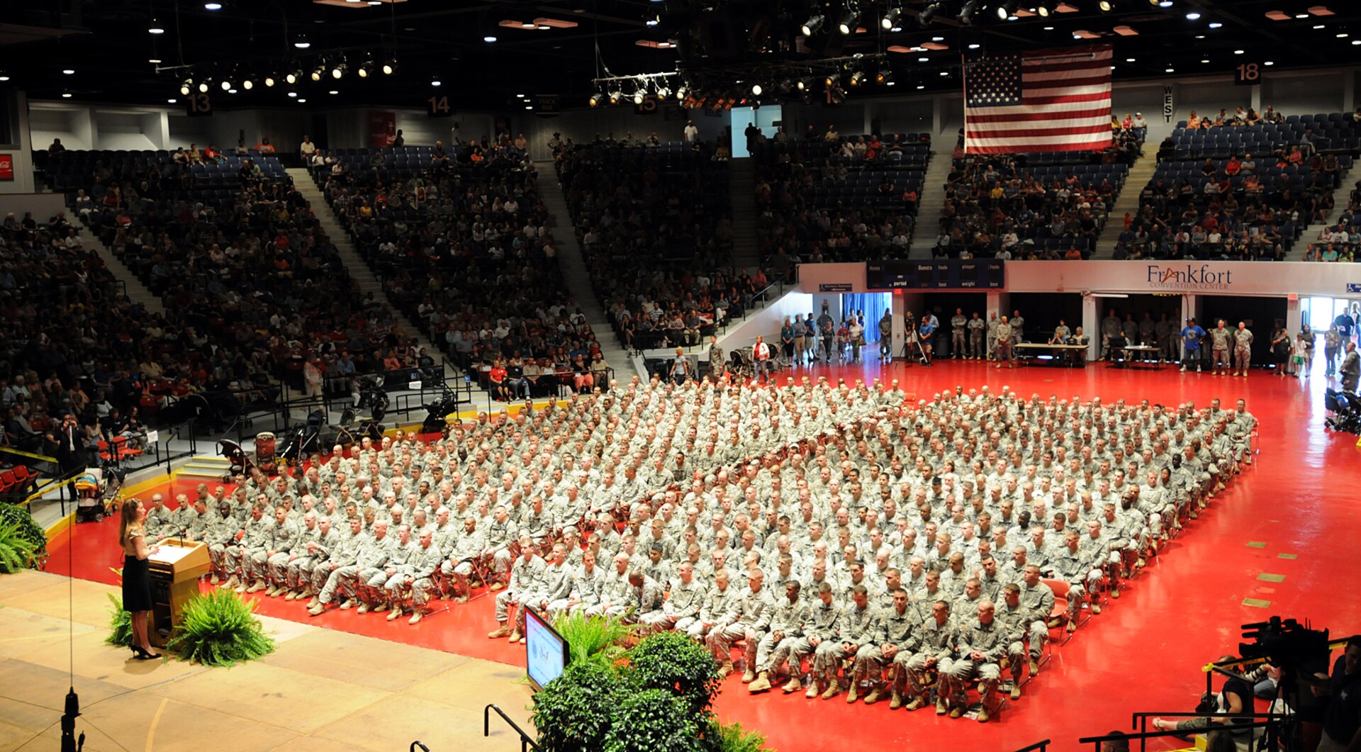 Kentucky's Secretary of State, Alison Lundergan Grimes speaks to the soldiers of the 2/138th Field Artillery during the unit's farewell ceremony in Frankfort, Ky., Aug. 31, 2012. Approximately 565 soldiers mobilized to the Horn of Africa for a scheduled nine-month deployment.