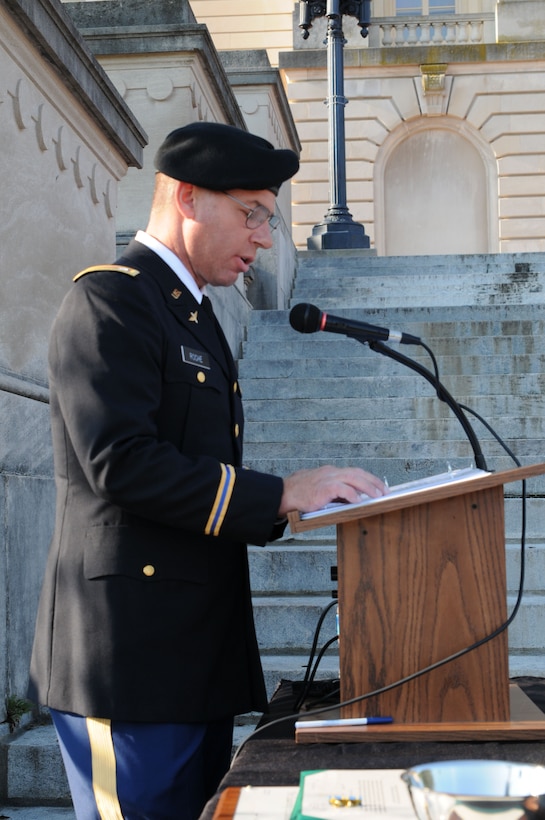 Cpt. Wesley Steenburg, Kentucky National Guard chaplain, provides the invocation during the 238th Regiment's OCS Commissioning Ceremony at the State Capitol in Frankfort, Ky., Aug 25. Class 54-12 graduated 11 new lieutenants to serve in the Kentucky National Guard.