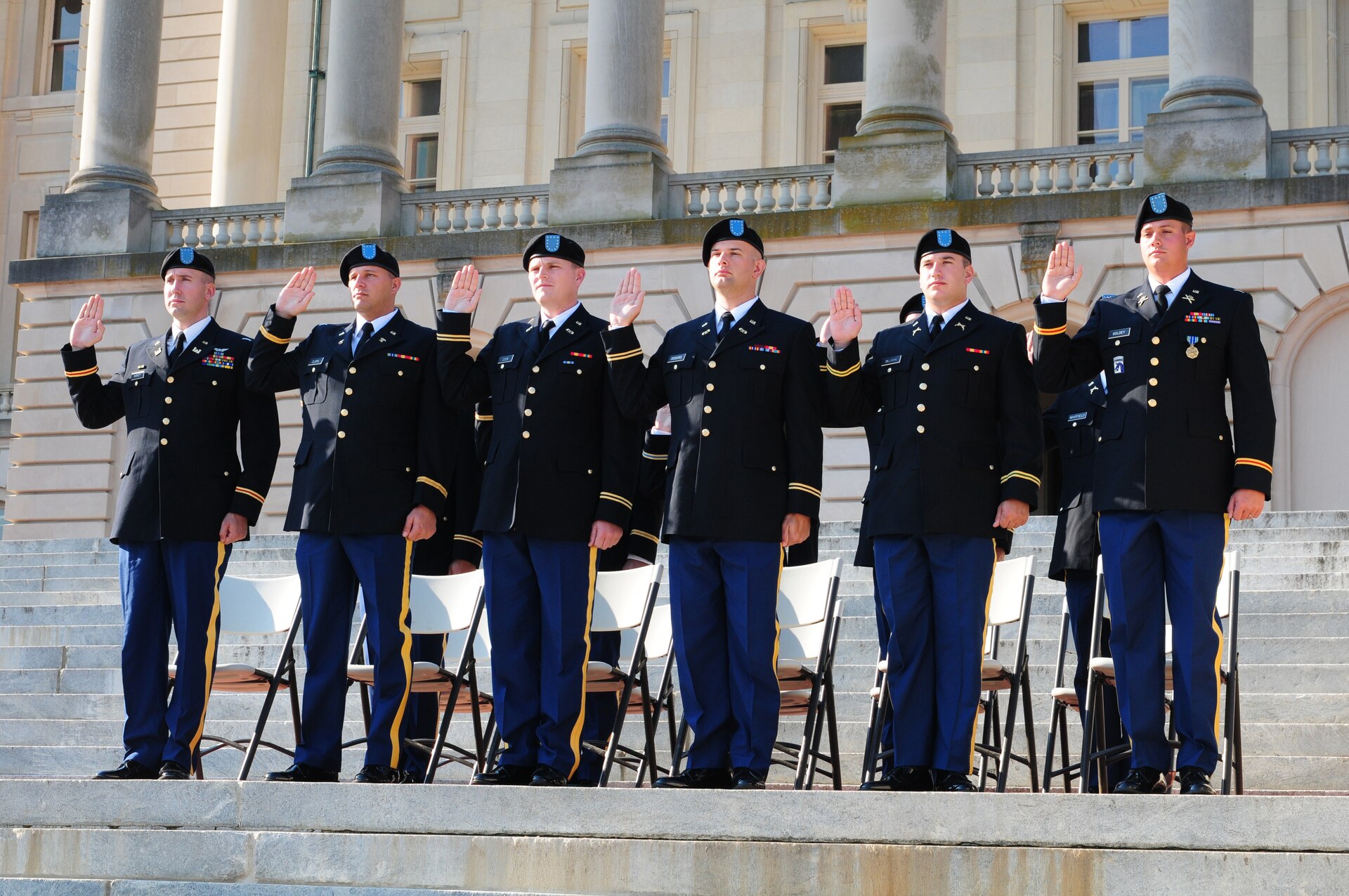 Members of Class 54-12 of Kentucky's Officer Candidate School swear-in to become new second Lieutenants as part of their graduation at the State Capitol in Frankfort, Ky., Aug. 25, 2012.