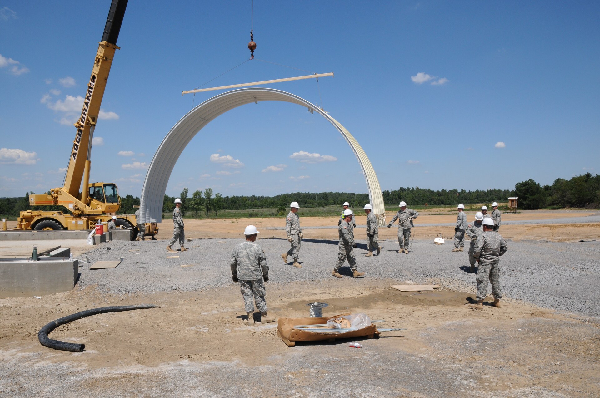 Soldiers of the 149th Vertical Engineer Company construct a K-span building, as part of a training course at Wendell H. Ford Regional Training Center in Greenville, Ky., Aug. 20, 2012.
