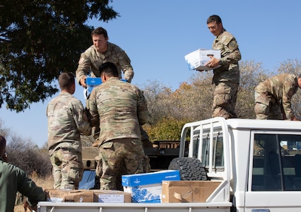 North Carolina National Guard Soldiers unload books to be distributed to Botswana schools Aug. 16, 2024. The Guard flew 2,000 books more than 8,000 miles to Botswana for elementary, lower secondary and upper secondary schools.