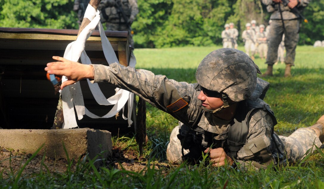 U.S. Army Pvt. Cory M. Perry, an infantryman with Alpha Company, 1st Battalion, 149th Infantry Regiment, Kentucky Army National Guard, fast ropes from a UH-60 Black Hawk Helicopter assigned to Bravo Company, 2nd Battalion, 147th Aviation Regiment, during a fast rope insertion/extraction system training exercise at the Harold L. Disney Training Center in Artemus, Ky., July 17, 2012.  (U.S. Army National Guard photo by Sgt. David Bolton/Released)