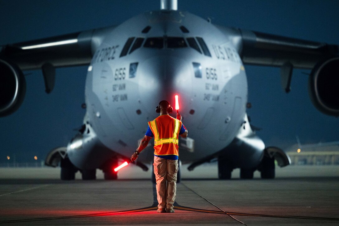 A U.S. Air Force C-17 Globemaster III, assigned to the 60th Air Mobility Wing, Travis Air Force Base, Calif., arrives at an undisclosed location