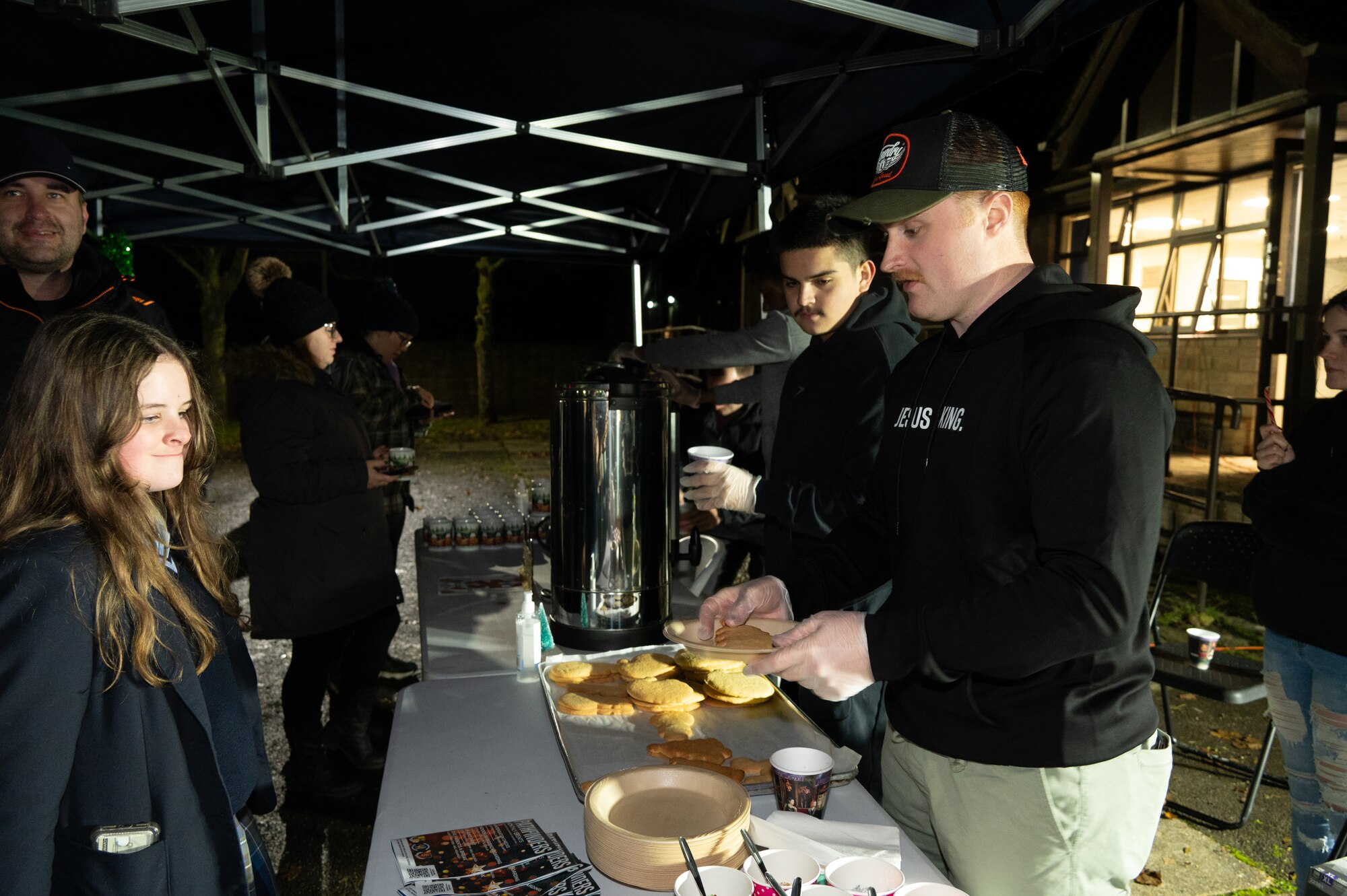 U.S. Air Force Airman 1st Class Christian Armour, 420th security forces squadron response force leader, decorates cookies