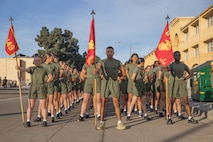 New U.S. Marines with Golf Company, 2nd Recruit Training Battalion, pose for a photo prior to the company motivational run at Marine Corps Recruit Depot San Diego, California, Nov. 25, 2024. The company motivational run is a three-mile cadence run conducted around the Depot, the last physical training event the Marines will conduct before they graduate from MCRD San Diego and the first time their friends and families will see their newly transformed U.S. Marines. (U.S. Marine Corps photo by Cpl. Alexandra M. Earl)