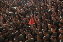 New U.S. Marines with Golf Company, 2nd Recruit Training Battalion, gather for instruction prior to the company motivational run at Marine Corps Recruit Depot San Diego, California, Nov. 25, 2024. The company motivational run is a three-mile cadence run conducted around the Depot, the last physical training event the Marines will conduct before they graduate from MCRD San Diego and the first time their friends and families will see their newly transformed U.S. Marines. (U.S. Marine Corps photo by Cpl. Alexandra M. Earl)