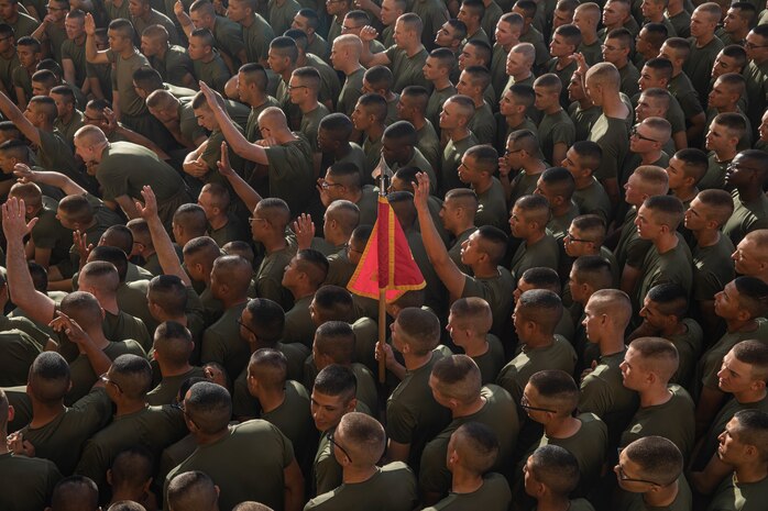 New U.S. Marines with Golf Company, 2nd Recruit Training Battalion, gather for instruction prior to the company motivational run at Marine Corps Recruit Depot San Diego, California, Nov. 25, 2024. The company motivational run is a three-mile cadence run conducted around the Depot, the last physical training event the Marines will conduct before they graduate from MCRD San Diego and the first time their friends and families will see their newly transformed U.S. Marines. (U.S. Marine Corps photo by Cpl. Alexandra M. Earl)