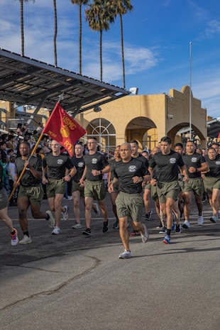 U.S. Marines with Recruit Training Regiment, Marine Corps Recruit Depot San Diego, participate in the company motivational run for Golf Company, 2nd Recruit Training Battalion as a part of Spiritual Fitness Month at MCRD San Diego, California, Nov. 25, 2024. Spiritual Fitness Month is a program implemented to bring awareness to spiritual health. MCRD San Diego is the first Marine Corps Base to implement this program. The company motivational run is a three-mile cadence run conducted around the Depot, the last physical training event the Marines will conduct before they graduate from MCRD San Diego and the first time their friends and families will see their newly transformed U.S. Marines. (U.S. Marine Corps photo by Cpl. Alexandra M. Earl)