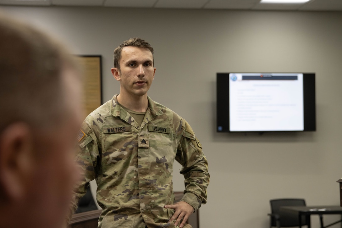 Sgt. Sam Walters takes questions from county officials during a presentation in Bardstown, Nov. 19. Members of the Kentucky National Guard County Outreach Team speak to Nelson County Emergency Management and elected officials about emergency planning and to identify any shortfalls in resources where the Guard can assist. (U.S. Army National Guard Photo by Milt Spalding)