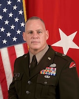 Brig. Gen. Christopher W. Cook was commissioned on Dec. 16, 1994, through ROTC at East Central University in Oklahoma and entered Active Duty on Jan. 16, 1995, attending the Field Artillery Officer Basic Course before serving with the 6th Battalion, 32nd Field Artillery Regiment as a Platoon Leader, Maintenance Officer, and Battalion S-1. He transferred to the Army Reserve on May 31, 1999, and holds a Bachelor of Science in management from East Central University, an MBA from the University of Dallas, and a Master of Arts in strategic security studies from the National Defense University. Currently the Deputy Commanding General-Support for the 63d Readiness Division and DCG-Mobilization at Fort Cavazos, Texas, he previously commanded the 78th Training Division and held leadership roles across the 95th Division (IT) and 75th Training Command, among others. Recalled to Active Duty from 2004 to 2006 and again in 2012-2013, he deployed to Afghanistan in 2009, leading an Embedded Training Team. His military education includes Airborne School, Intermediate Level Education, and the National War College, and his awards include the Bronze Star, Meritorious Service Medal (3 OLC), and Combat Action Badge. Brig. Gen. Cook is a senior system engineer at AT&T and a father of two daughters.