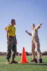 U.S. Marine Corps Sgt. Felipe Morales, a drill instructor with Echo Company, 2nd Recruit Training Battalion, instructs recruits during an introduction to a combat fitness training event at Marine Corps Recruit Depot San Diego, California, Nov. 13, 2024. The CFT is an annual fitness test that is required of all Marines to pass and maintain consisting of an 880-yard sprint, ammunition can lifts, and a maneuver under fire drill. (U.S. Marine Corps photo by Lance Cpl. Eric Valerio)