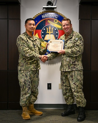 Hospital Corpsman 1st Class Henry Nguyen poses for a photo during his graduation from the Aviation Physiologist Technician course at the Naval Aerospace Medical Institute (NAMI), Aug. 22. Students of the course now receive transferrable college credit through the Uniformed Services University and their College of Allied Health Sciences. The Navy Medicine Operational Training Command (NMOTC) is the Navy’s leader in operational medicine and trains specialty providers for aviation, surface, submarine, expeditionary, and special operations communities. With five detachments, 12 training centers, and facilities in over 60 locations across the United States, NMOTC provides high impact individual medical training for the Navy, other U.S. armed forces, and allied nations around the globe. (U.S. Navy photo by Mass Communication Specialist 1st Class Russell Lindsey SW/AW)