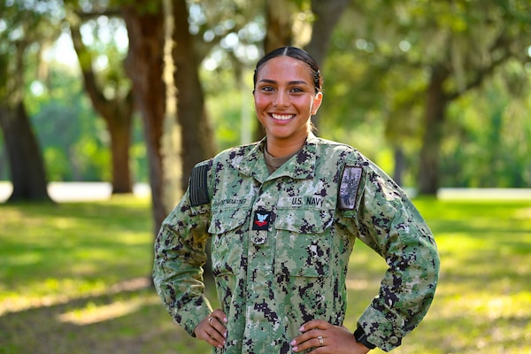 Hospital Corpsman 2nd Class Jocelyne Palacios-Martinez poses for a photo after her graduation from the Aviation Physiologist Technician course at the Naval Aerospace Medical Institute (NAMI), Aug. 22. Students of the course now receive transferrable college credit through the Uniformed Services University and their College of Allied Health Sciences. The Navy Medicine Operational Training Command (NMOTC) is the Navy’s leader in operational medicine and trains specialty providers for aviation, surface, submarine, expeditionary, and special operations communities. With five detachments, 12 training centers, and facilities in over 60 locations across the United States, NMOTC provides high impact individual medical training for the Navy, other U.S. armed forces, and allied nations around the globe. (U.S. Navy photo by Mass Communication Specialist 1st Class Russell Lindsey SW/AW)