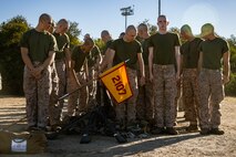 U.S. Marine Corps recruits with Echo Company, 2nd Recruit Training Battalion, stage their gear prior to an introduction to a combat fitness training event at Marine Corps Recruit Depot San Diego, California, Nov. 13, 2024. The CFT is an annual fitness test that is required of all Marines to pass and maintain consisting of an 880-yard sprint, ammunition can lifts, and a maneuver under fire drill. (U.S. Marine Corps photo by Lance Cpl. Eric Valerio)