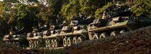 U.S. Marines with the 3rd Light Armored Reconnaissance Battalion, 31st Marine Expeditionary Unit, transport in light armored vehicles during weapons field training at Camp Schwab, Okinawa, Japan, Nov. 27, 2024.