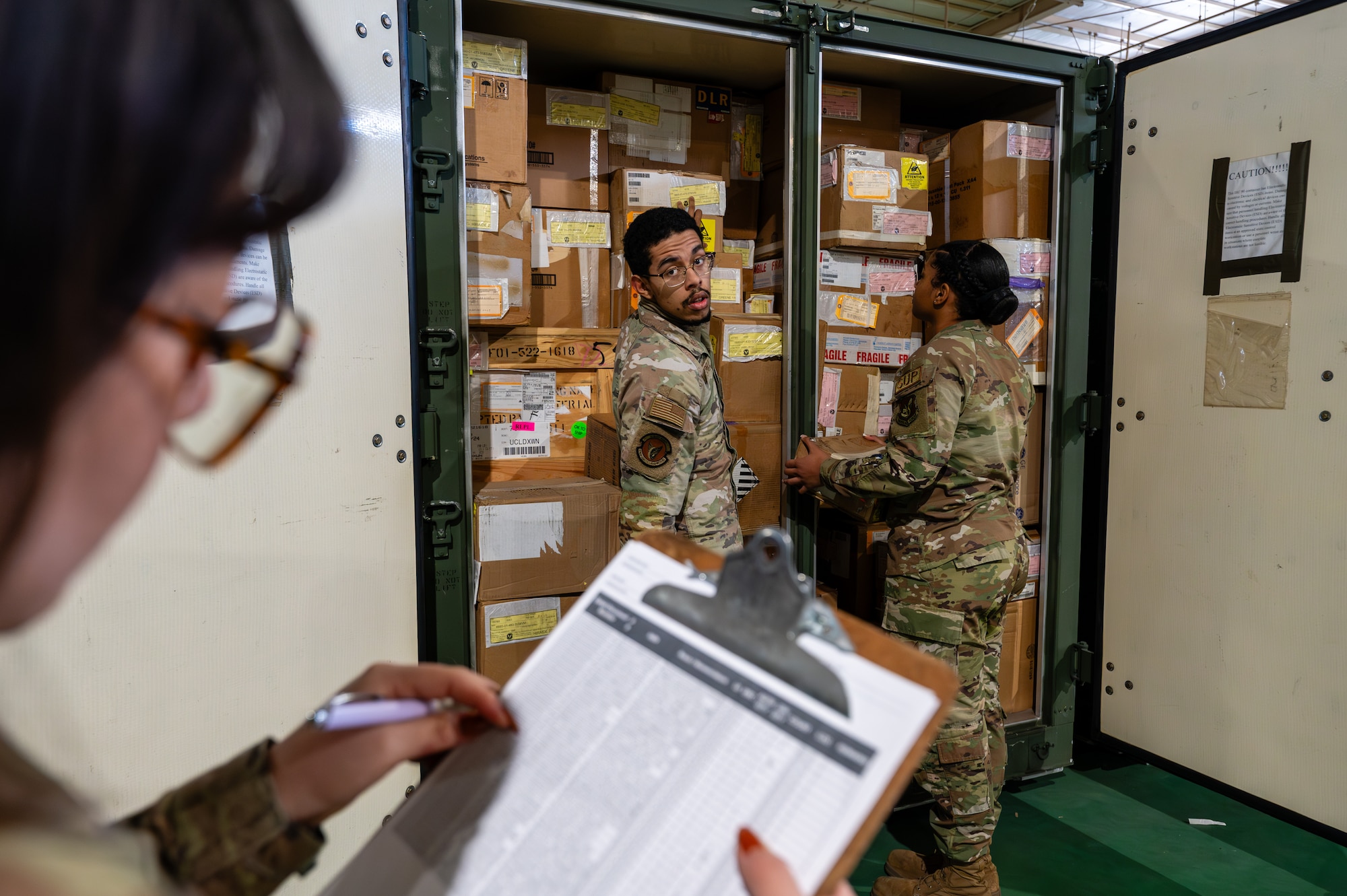 Airmen assigned to the 374th Logistics Readiness Squadron conduct an inventory of aircraft maintenance items for Operation Christmas Drop 2024 at Yokota Air Base, Japan.
