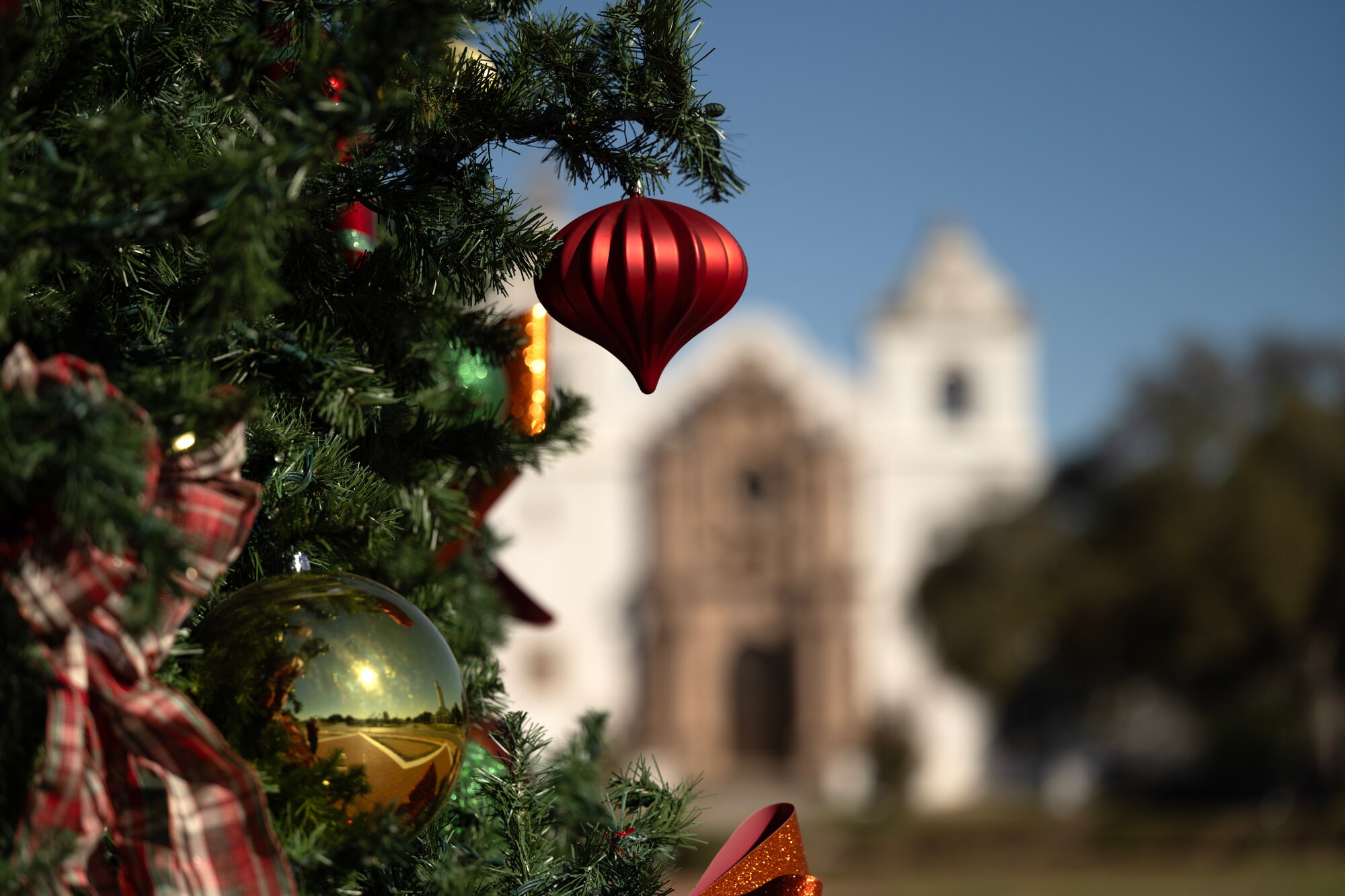 One of the Joint Base San Antonio holiday trees stands in front of Chapel One at JBSA-Randolph, Texas, Nov. 21, 2024.