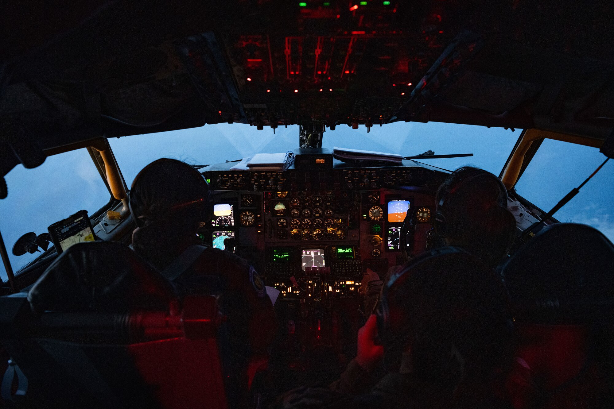 KC-135 pilots conduct precise flight paths to facilitate mid-air refueling, coordinating with boom operators to ensure safe flight operations.