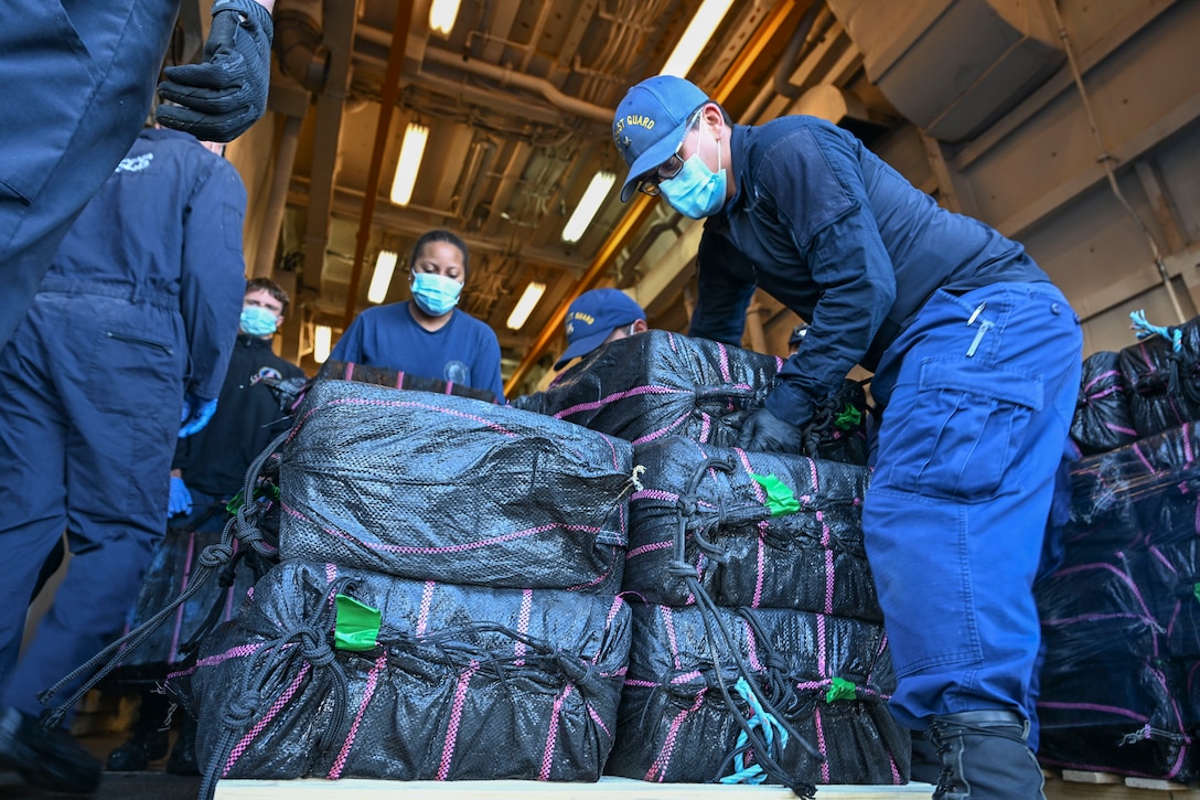 Crewmembers from Coast Guard Cutter Hamilton offload bales of interdicted narcotics in Port Everglades, Florida, Dec. 2, 2024. Hamilton’s crew offloaded more than 16,100 pounds of cocaine worth an assessed street value of approximately $182.8 million that the Coast Guard and its partners intercepted in the international waters of the Eastern Pacific Ocean. (U.S. Coast Guard photo by Petty Officer 3rd Class Eric Rodriguez)