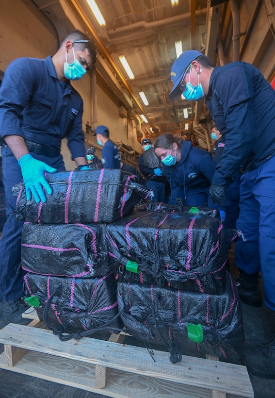 Crewmembers from Coast Guard Cutter Hamilton offload bales of interdicted narcotics in Port Everglades, Florida, Dec. 2, 2024. Hamilton’s crew offloaded more than 16,100 pounds of cocaine worth an assessed street value of approximately $182.8 million that the Coast Guard and its partners intercepted in the international waters of the Eastern Pacific Ocean. (U.S. Coast Guard photo by Petty Officer 3rd Class Eric Rodriguez)