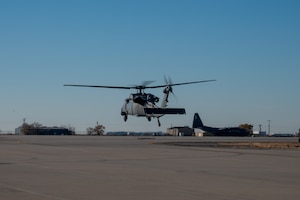 A HH-60G Pave Hawk helicopter lifts-off for its final flight before retirement at Kirtland Air Force Base, Albuquerque, N.M., Dec. 3. The HH-60G Pave Hawk is being replaced by the HH-60W Jolly Green II. (U.S. Air Force photo by Airman 1st Class Donnell Schroeter)