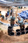 U.S. Air Force Maj. Anh Ison, 28th Medical Group pharmacy element chief, right, and a fellow Defense POW/MIA Accounting Agency volunteer pose for a photo during a mission July 2024. Ison acted as a linguist for her DPAA team and was responsible for communication between the team leader, the archaeologist, and Vietnamese government officials. (U.S. Air Force Courtesy Photo)