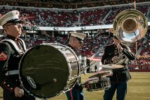 U.S. Marine Corps Sgt. Bryan Lester, right, Cpl. Benjamin Steinquest, center, and Lance Cpl. Jesse Powers, left, all with Marine Band San Diego, perform during the pregame show before the San Francisco 49ers Salute to Service game vs. the Seattle Seahawks at Levi’s Stadium Santa Clara, California. Nov. 17, 2024. The Marine Band San Diego participated in the Salute to Service game to help honor the nation's service members, veterans and their families. (U.S. Marine Corps photo by Cpl. Sarah M. Grawcock)