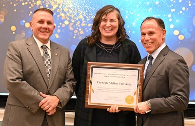 DCSA Deputy Director Daniel Lecce presents the Donnelly Award to Carnegie Mellon University.