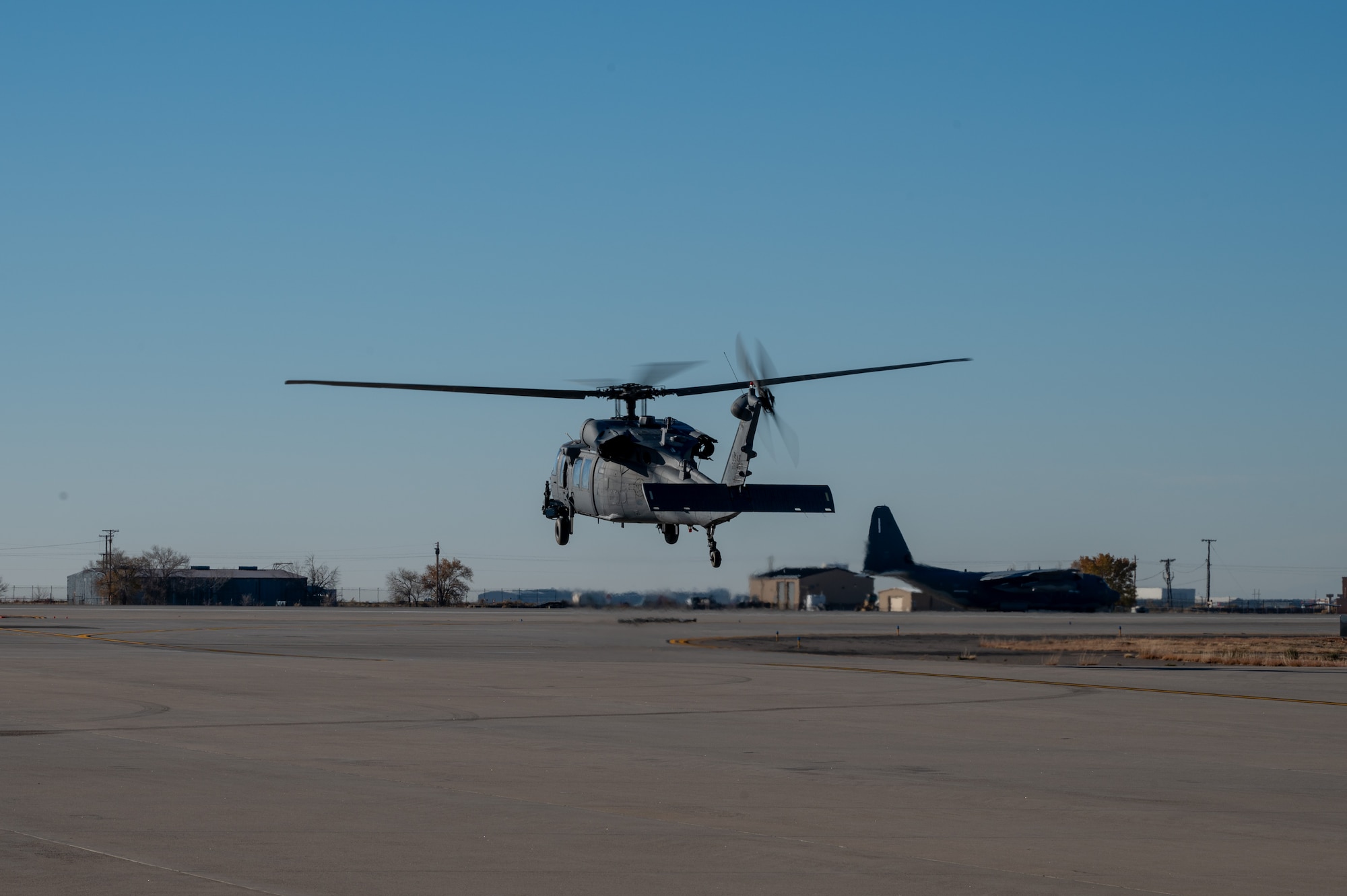 A HH-60G Pave Hawk helicopter lifts-off for its final flight before retirement at Kirtland Air Force Base, Albuquerque, N.M., Dec. 3. The HH-60G Pave Hawk is being replaced by the HH-60W Jolly Green II. (U.S. Air Force photo by Airman 1st Class Donnell Schroeter)