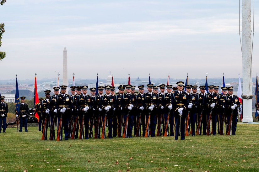 Soldiers assigned to the 3d U.S. Infantry Regiment (The Old Guard) stand in formation on Whipple Field during a ceremony.