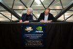 Retired U.S. Navy Vice Adm. Ann Rondeau, left, and NVIDIA Vice President of External Affairs Ned Finkle sign a cooperative research and development agreement (CRADA) at NVIDIA Corporation’s headquarters in Santa Clara, California. The CRADA between NPS and NVIDIA outlines plans for collaboration on the development of artificial intelligence-based technologies for learning and other real-world applications.