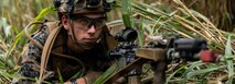 U.S. Marine Corps Lance Cpl. Nicodemus Williams, a native of Michigan and a rifleman with 3d Littoral Combat Team, 3d Marine Littoral Regiment, 3d Marine Division, sets security during a platoon attack at Marine Corps Training Area Bellows, Hawaii, Nov. 19, 2024.