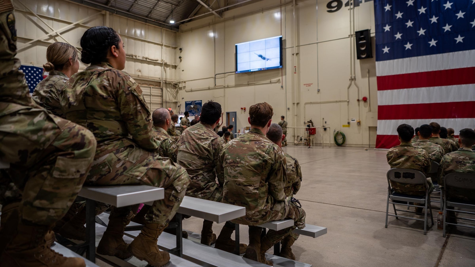 944th Fighter Wing Reserve Citizen Airmen view training materials during a Ready Start Brief for Exercise Desert Hammer 25-1 at Luke Air Force Base, Ariz., Nov. 13, 2024. Set against the unmatched backdrop of the Barry M. Goldwater Range, Desert Hammer leverages Arizona’s strategic geography to provide realistic combat training for U.S. and allied forces. (U.S. Air Force photo by Senior Airman Jacob Dastas)