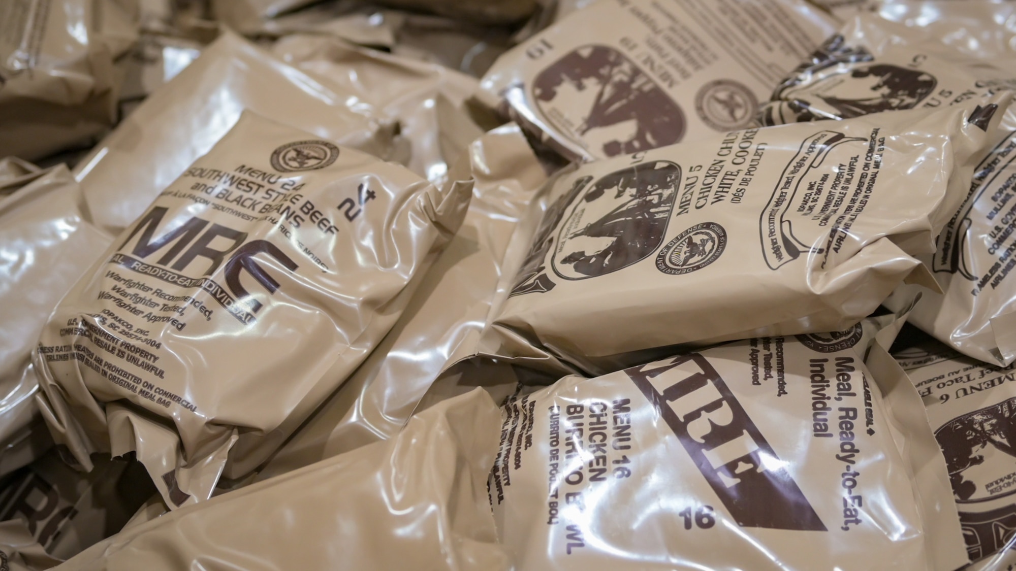 A supply of Meals Ready-to-Eat (MREs) is prepared for distribution to 944th Fighter Wing Reserve Citizen Airmen during Exercise Desert Hammer 25-1 at Luke Air Force Base, Ariz., Nov. 13, 2024. Set against the unmatched backdrop of the Barry M. Goldwater Range, Desert Hammer leverages Arizona’s strategic geography to provide realistic combat training for U.S. and allied forces. (U.S. Air Force photo by Tech. Sgt. Tyler J. Bolken)