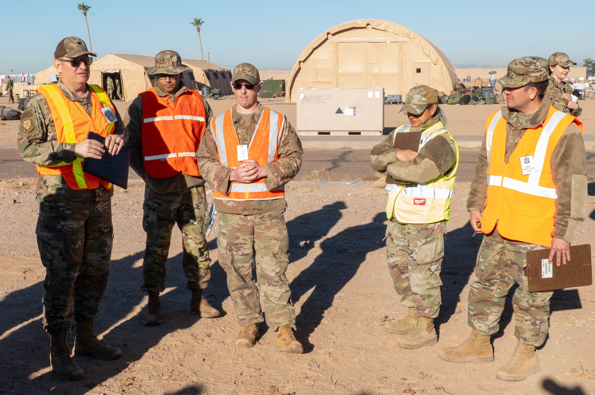 944th Fighter Wing Reserve Citizen Airmen of the Exercise Desert Hammer 25-1 inspection team gather at Gila Bend Air Force Auxiliary Field in Gila Bend, Ariz., Nov. 14, 2024. This large-scale exercise showcases the adaptability of Mission Ready Airmen, advancing the skills needed to thrive in the rapidly evolving challenges of global competition. (U.S. Air Force photo by Senior Airman Alexis Orozco)