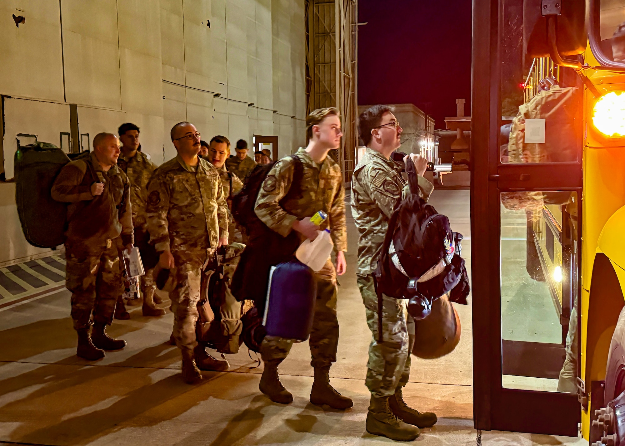 U.S. Air Force Reserve Citizen Airmen board buses at Luke Air Force Base, Ariz., Nov. 14, 2024, as they prepare for Exercise Desert Hammer 25-1. Through joint and multinational collaboration, Desert Hammer tests the ability of over 700 participants and 131 aircraft to operate, defend, and sustain airbases under austere conditions. (U.S. Air Force photo by Maj. Casey Staheli)