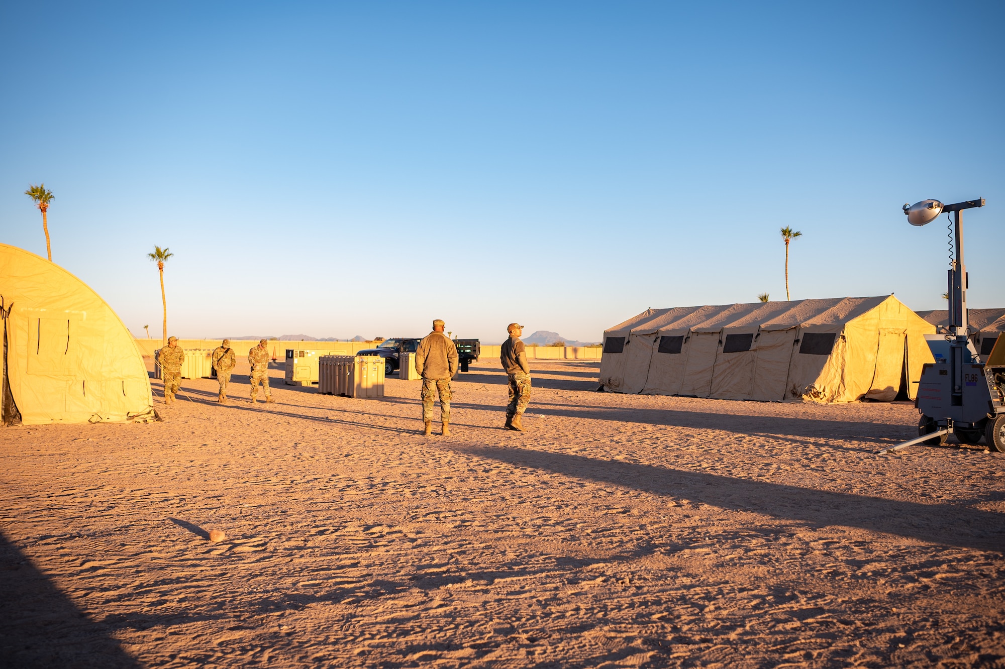 944th Fighter Wing Reserve Citizen Airmen gather and prepare for the day’s training activities during Exercise Desert Hammer 25-1 at Gila Bend Air Force Auxiliary Field, Ariz., Nov. 14, 2024. Set against the unmatched backdrop of the Barry M. Goldwater Range, Desert Hammer leverages Arizona’s strategic geography to provide realistic combat training for U.S. and allied forces. (U.S. Air Force photo by Tech. Sgt. Tyler J. Bolken)