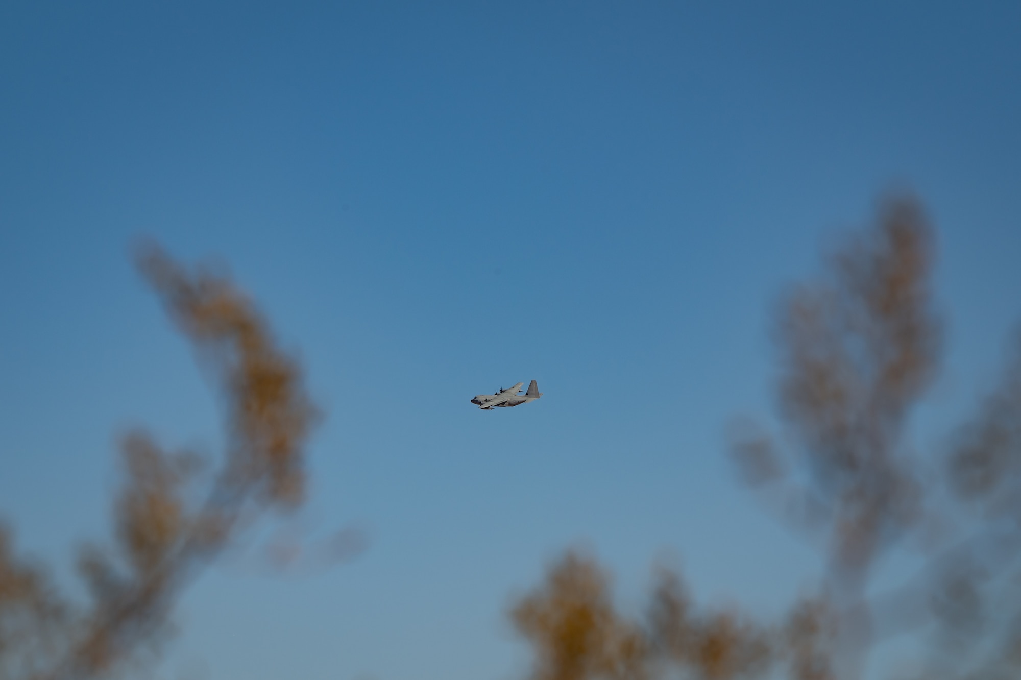 A U.S. Marine Corps KC-130J Hercules maneuvers during a training operation as part of Exercise Desert Hammer 25-1 at Auxiliary Airfield 6 near Gila Bend, Ariz., Nov. 14, 2024, following a precision air drop. This large-scale exercise showcases the adaptability of Mission Ready Airmen, advancing the skills needed to thrive in the rapidly evolving challenges of global competition. (U.S. Air Force photo by Tech. Sgt. Tyler J. Bolken)