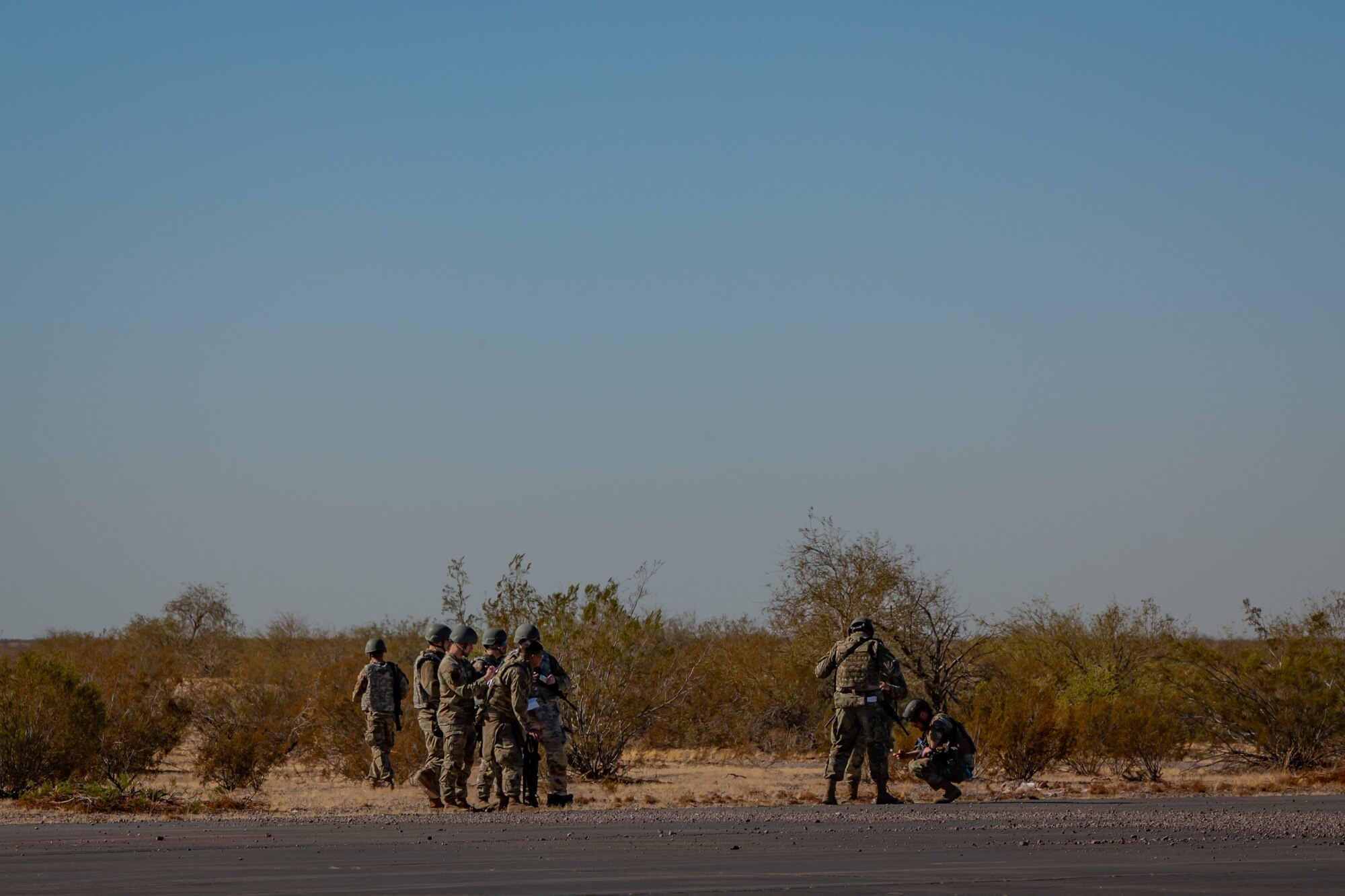 944th Fighter Wing Reserve Citizen Airmen monitor the release of cargo from a U.S. Marine Corps KC-130J Hercules during Exercise Desert Hammer 25-1 at Auxiliary Airfield 6 near Gila Bend, Ariz., Nov. 14, 2024. Through joint and multinational collaboration, Desert Hammer tests the ability of over 700 participants and 131 aircraft to operate, defend, and sustain airbases under austere conditions. (U.S. Air Force photo by Tech. Sgt. Tyler J. Bolken)