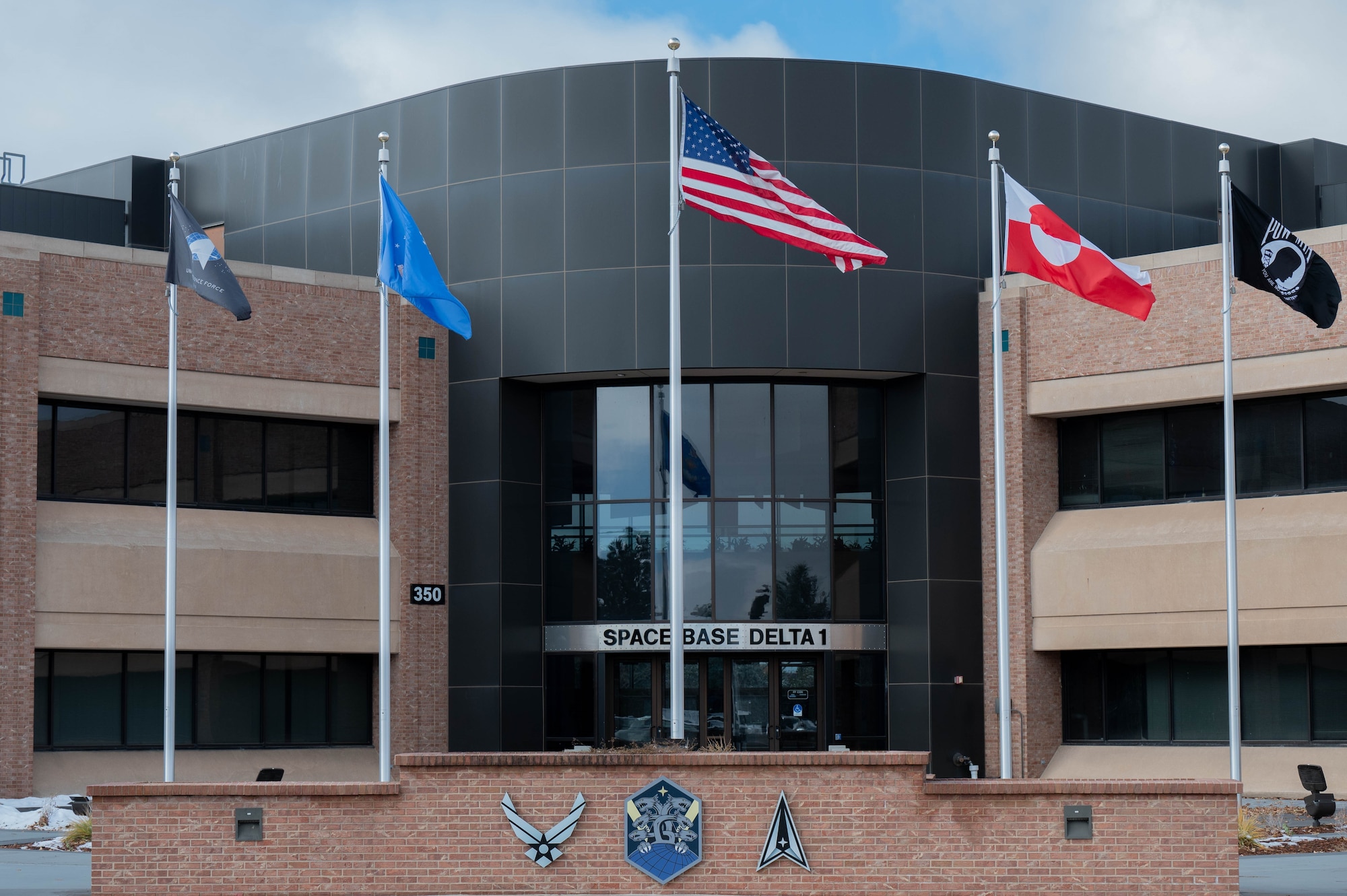 Photo of Space Base Delta 1 headquarters building at Peterson Space Force Base, Colorado.