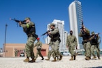 Naval Security Forces perform tactical team movements during active shooter drill in Bahrain.