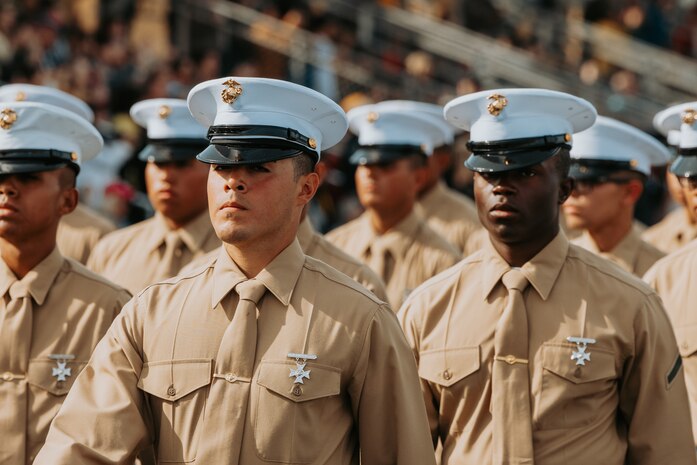 U.S. Marines with Golf Company, 2nd Recruit Training Battalion, march across the parade deck during their graduation ceremony at Marine Corps Recruit Depot San Diego, California, Nov. 26, 2024. Graduation took place at the completion of the 13-week transformation, which included training for drill, marksmanship, basic combat skills, and Marine Corps customs and traditions. (U.S. Marine Corps photo by Cpl. Alexander O. Devereux)