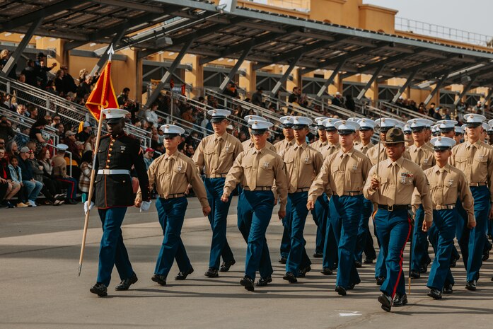 U.S. Marines with Golf Company, 2nd Recruit Training Battalion, march across the parade deck during their graduation ceremony at Marine Corps Recruit Depot San Diego, California, Nov. 26, 2024. Graduation took place at the completion of the 13-week transformation, which included training for drill, marksmanship, basic combat skills, and Marine Corps customs and traditions. (U.S. Marine Corps photo by Cpl. Alexander O. Devereux)