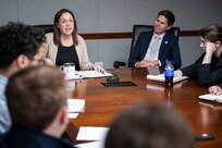Acting Under Secretary of Defense for Policy Sasha Baker speaks to College of William and Mary students during their visit to the Pentagon