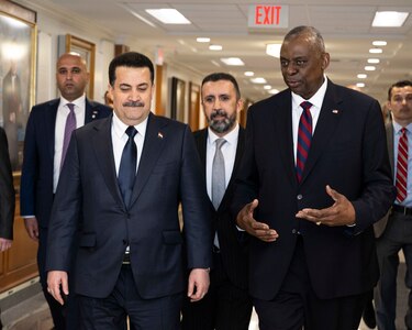 Secretary of Defense walks and speaks with Iraqi Prime Minister Mohammed Shia al-Sudani at the Pentagon